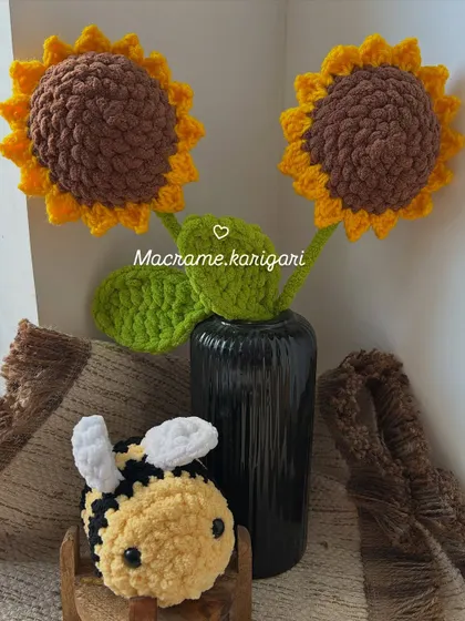 Our biggest sunflowers yet! These are made with chunky yarn for a large, plush flower head. Paired with a little bumblebee friend, they create a beautiful and cheerful decorative set.