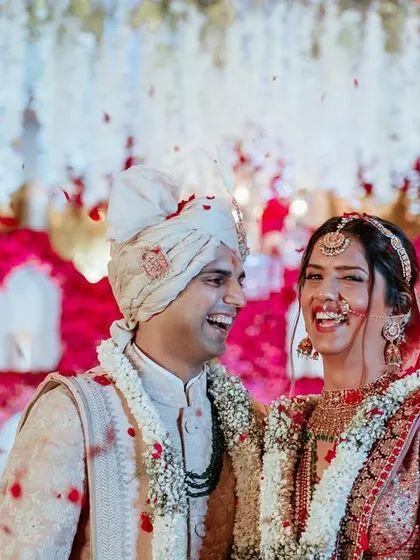 Laughter under a shower of petals. These are the priceless moments that become cherished memories for a lifetime.