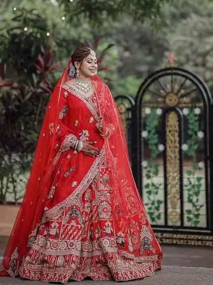 This bride is the picture of grace. Her makeup was kept classic and clean to let her and her magnificent red lehenga be the stars of the show.