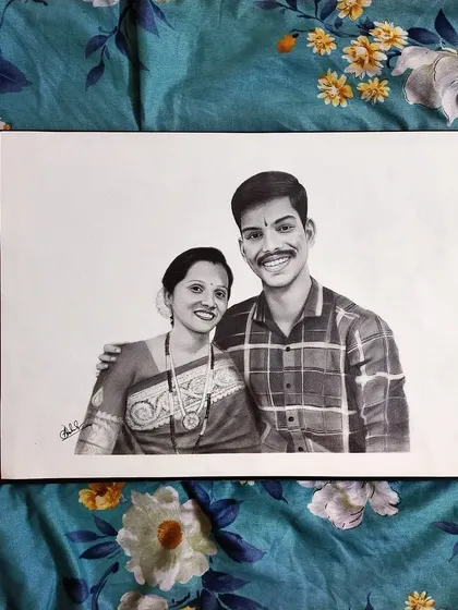 Here is another view of the finished mother and son graphite sketch. The A3 size allows for plenty of detail in the expressions and clothing, creating a full and realistic portrait.
