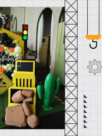 A duplicate of image 99, showing the fun, interactive props at the construction party.