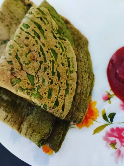 Another serving of our nutritious besan palak chilla, showcasing its nice texture and colour.