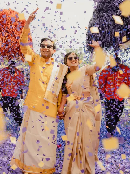 The pure, unscripted joy of a Haldi celebration. We believe in creating moments of genuine connection and fun, where couples are surrounded by the vibrant energy of their loved ones. This confetti-filled entry captures that spirit perfectly.