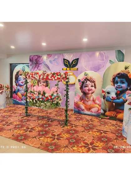 Another perspective of the beautiful Krishna-themed naming ceremony setup.