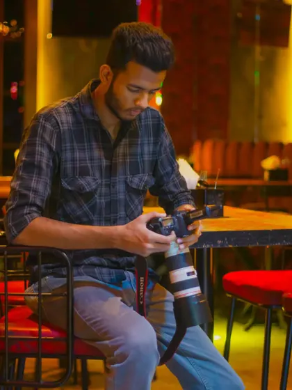 Reviewing shots on the back of the camera is a key part of my process. I make sure we are capturing the vision we discussed throughout the shoot.