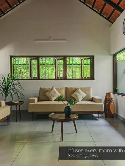 In this project, we crafted matching sofas for a large, open-plan living room with a traditional Keralan architectural feel. The neutral upholstery keeps the space feeling light and airy.