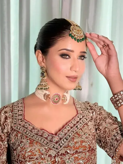 Marwar brides are the new era of royal. This shot highlights the passa and the bride's confident gaze.