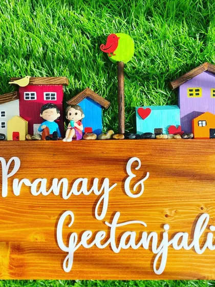 A vibrant and colorful neighborhood scene, all on one nameplate. This design is perfect for those who love a pop of color and a playful touch for their home entrance.