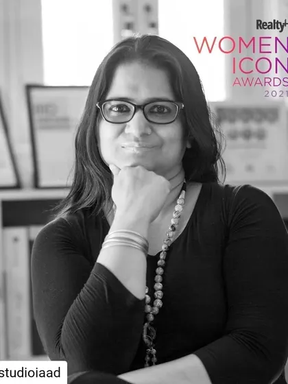 A portrait celebrating the 'Women Achievers in Leading Flexispaces' award from the Realty+ Women Icon Awards 2021. This honor reflects our studio's dedication to innovative and adaptable design.