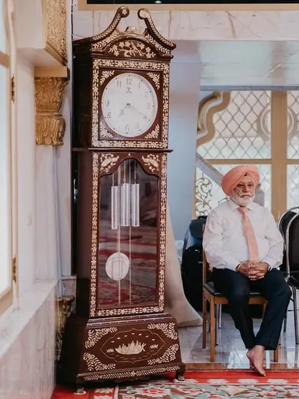 Two elders waiting patiently for the ceremony to begin. I find so much character and story in the faces of the guests who are there to give their blessings.