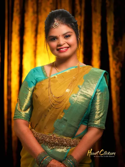 A smiling portrait of the bride, looking radiant and happy on her engagement day.