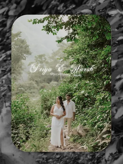 A lovely portrait of a couple walking through a lush green path during their pre-wedding shoot. The natural setting and their relaxed interaction make for a beautiful, candid moment.