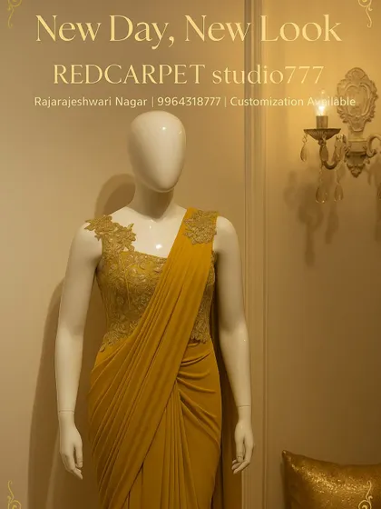 This mustard yellow pre-draped saree gown is designed for making a statement. The outfit is built around a corseted bodice with intricate floral embroidery that extends over the shoulder, while the lycra fabric creates beautiful, fluid drapes.