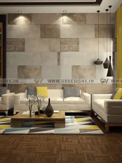 We designed this living room to feel warm and inviting, using a combination of textures and natural tones. The space features a comfortable sofa set, a geometric-patterned rug, and a feature wall with stone-textured tiles, all illuminated by a mix of ambient and accent lighting.