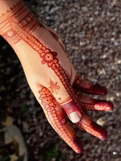 A close-up look at the beautiful maroon stain from one of my designs. You can see how the color has developed evenly, highlighting the fine lines and details of the artwork.