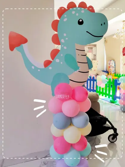 We even added some friendly dinosaurs to Saesha's magical party! This cute blue dinosaur cutout with a pastel balloon base was a fun addition to the decor.