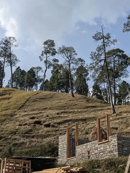 A view of the Himalayan landscape where our guesthouses are being constructed. The project is carefully sited on agricultural terraces, or 'khets', to minimize disruption to the natural contours of the land.