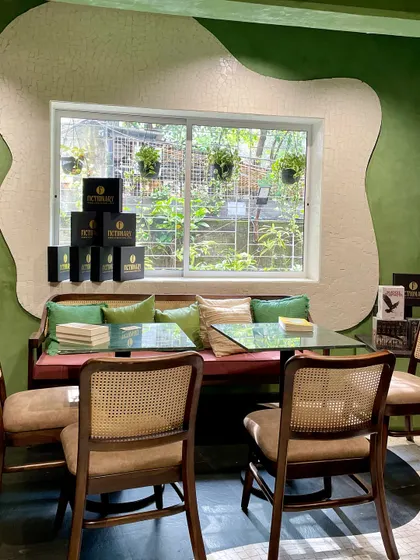 The serene setup at Fictionary Bookstore Cafe, ready for our singles book club. Creating a comfortable and inviting space is my top priority.
