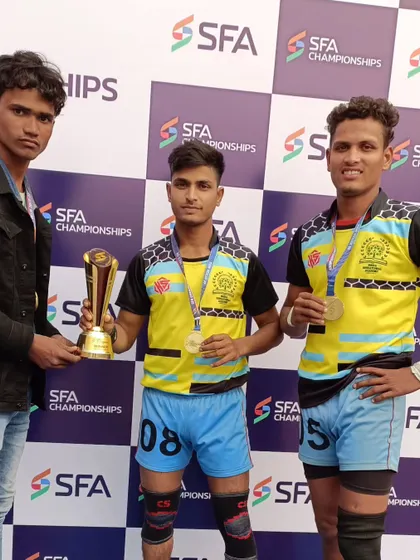 Our players with their medals and trophy after a successful SFA Championship.