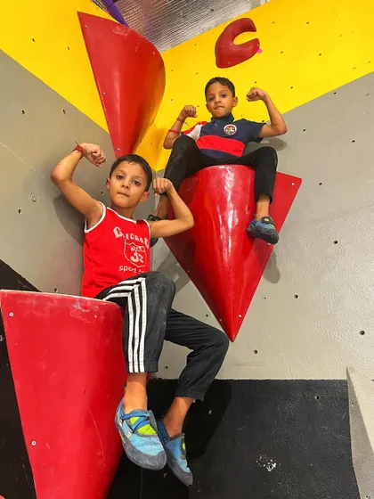 Flexing those new climbing muscles! These two little crushers are showing off their strength after a great session. We love seeing kids build confidence and have fun on our walls.