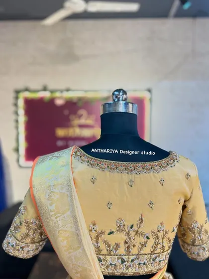 The back view of the cream bridal blouse, showing the simple and clean design.