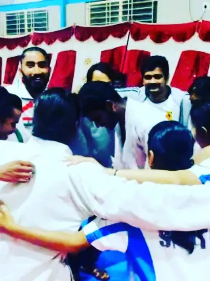 This is what our team is about. A group huddle after a successful run at the SIKKA National Championship. We celebrate our wins and support each other as a family.