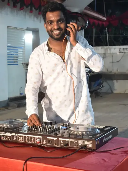 Listening closely to the mix. Ensuring the sound is perfect is my top priority at every wedding function.