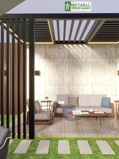 A close-up of the proposed pergola seating in the Model Town design, combining stone-textured walls and wooden flooring.