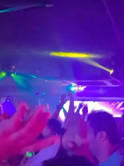 Hands in the air for a Bollywood night. The energy of a crowd singing along to their favorite tracks is unbeatable, and I bring that same excitement to private parties.