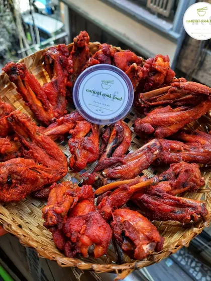 A basket full of my crispy fried chicken wings, a perfect party snack.