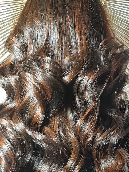 Another angle of this delicious warm brunette color. The light catches the different tones, creating a rich and multi-dimensional effect.