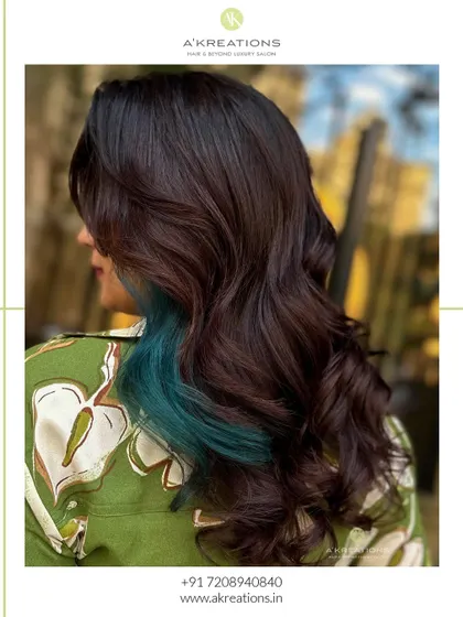 Feeling adventurous? We created this peacock green hair transformation, pairing the bold color with a trendy cut for a standout look.
