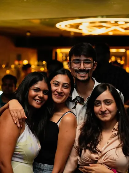 A group of friends enjoying the 'Friday Switch' event. Weekends start here.