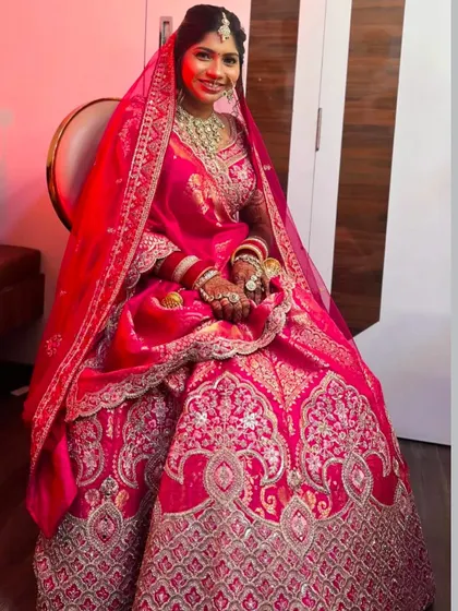 The complete royal bride look. I created a full glam look with shimmery eyes for this bride in her magnificent pink lehenga, making sure she looked and felt like a queen.