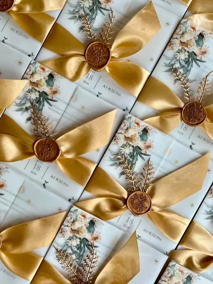 A duplicate image of the array of S&S wedding invitations.