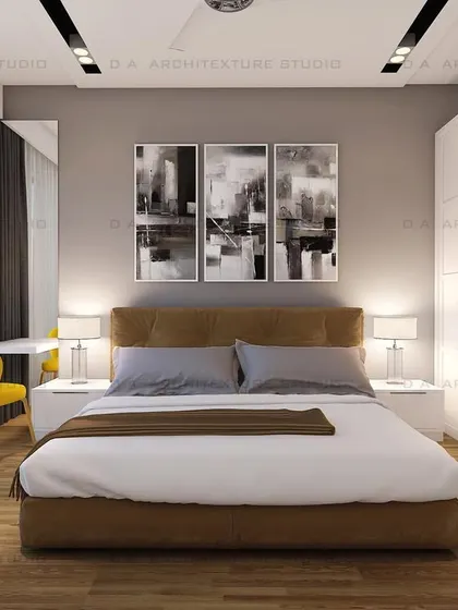 Another angle of the same bedroom, showing a classic white wardrobe and abstract art, creating a balanced and modern look.