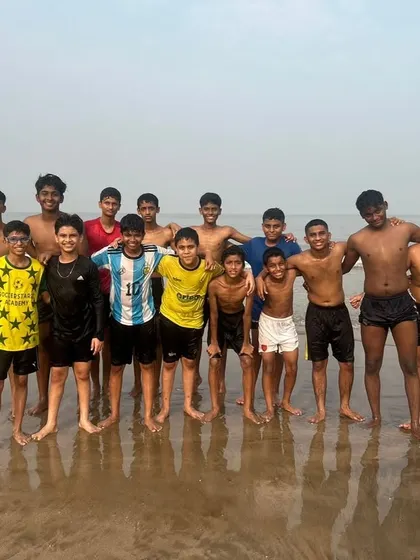 Our team during a beach training day. This session helps build stamina and strength in a different environment, while also being a great team-bonding experience.