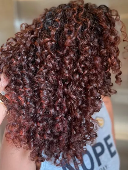 Another angle of these gorgeous Pumpkin Spice curls. The color is perfectly placed to enhance the natural curl pattern.