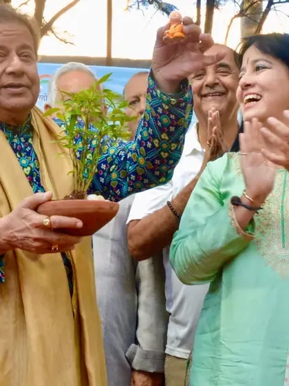 A beautiful moment from a 'Positive Weekends' event, where we presented the guest artist, Shri Anup Jalota ji, with a potted plant instead of cut flowers. This is a small but significant part of our 'Go Green' initiative.