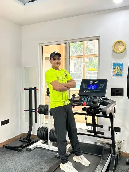 Arms crossed, ready for cardio.