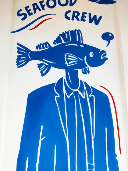 A quirky 'fish head' illustration, part of a larger seafood themed mural we designed for a restaurant in Goa. We love creating art with a sense of humor.