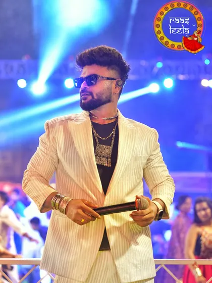 A stylish shot from a Navratri event. Even in a modern suit, I bring a traditional touch with my accessories.