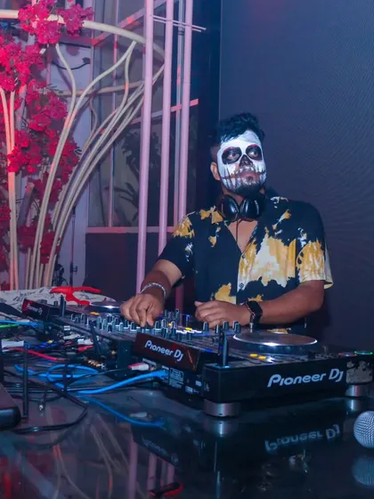Fully committed to the Halloween theme behind the decks.