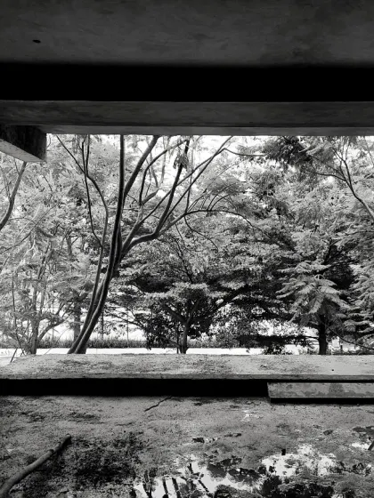Even in its raw state, a well-planned space frames a view. This under-construction window opening was designed to perfectly frame the natural landscape outside, grounding the home and connecting it to its surroundings.