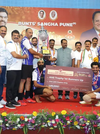 A closer look at the team receiving the trophy. Every player contributed to this success, and it was a proud moment for all of us.
