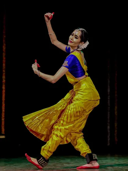 A candid shot from the 'Youth in Dance' festival, capturing a moment of dynamic movement and pure joy during my solo performance.