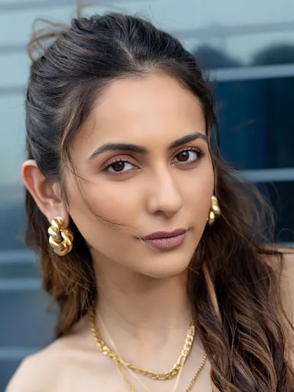 Rakul Preet looking effortlessly chic in my Braided Beauty Hoops. These chunky gold hoops are versatile enough for a casual day out or a glam night.