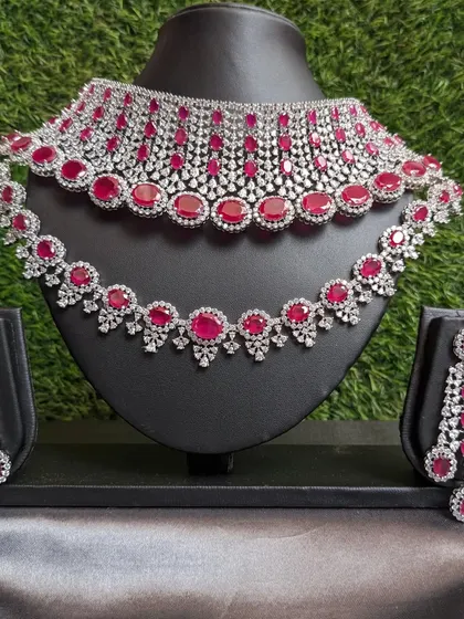 A two-layered choker with classic ruby stones and AD sparkle, a gorgeous choice for a reception or party.