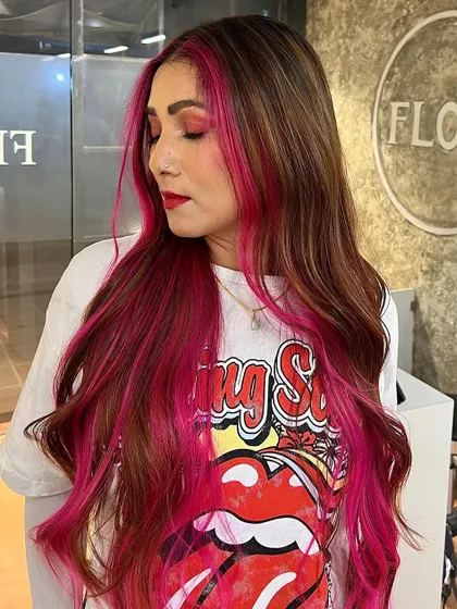 Another angle of this stunning pink transformation. The placement of the pink highlights frames her face and adds so much drama.