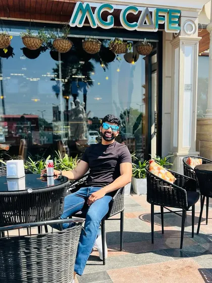 Enjoying a chilled diet coke at a cafe. It's all about balance and finding ways to relax and enjoy yourself.